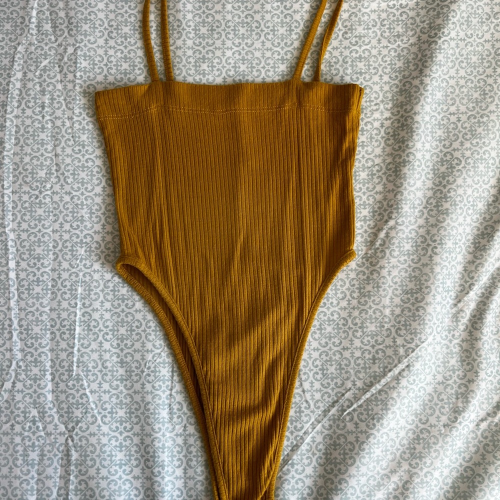 LF Stores: yellow bodysuit